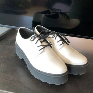 White bowler platform shoes